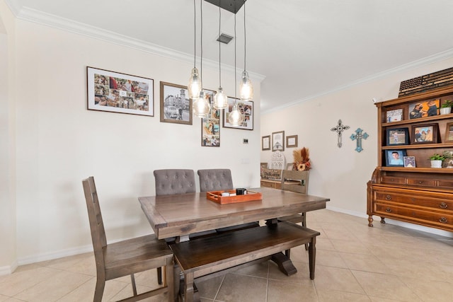 dining space featuring light tile patterned flooring, crown molding, and visible vents