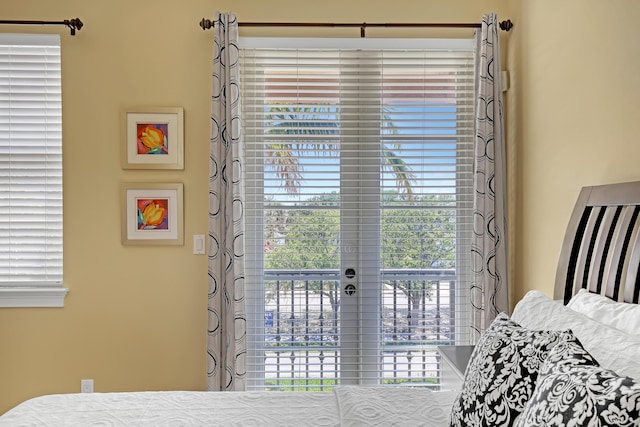 bedroom featuring access to outside