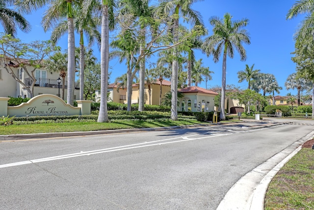 view of road with curbs and a residential view