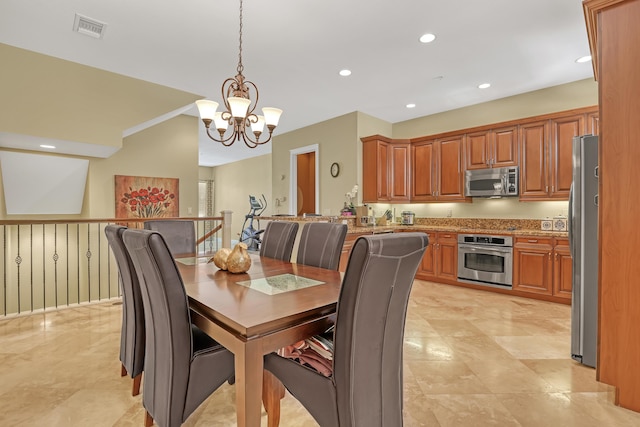 dining room with recessed lighting, visible vents, and a chandelier