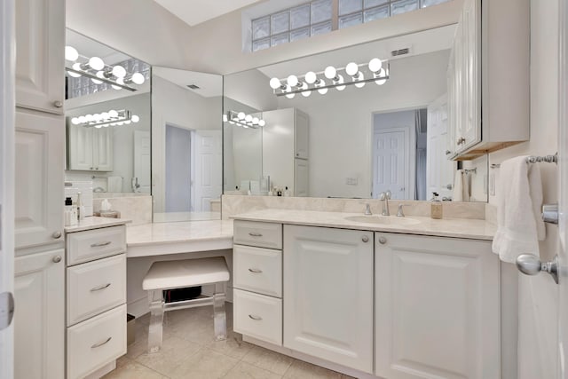 full bath featuring tile patterned floors, visible vents, and vanity