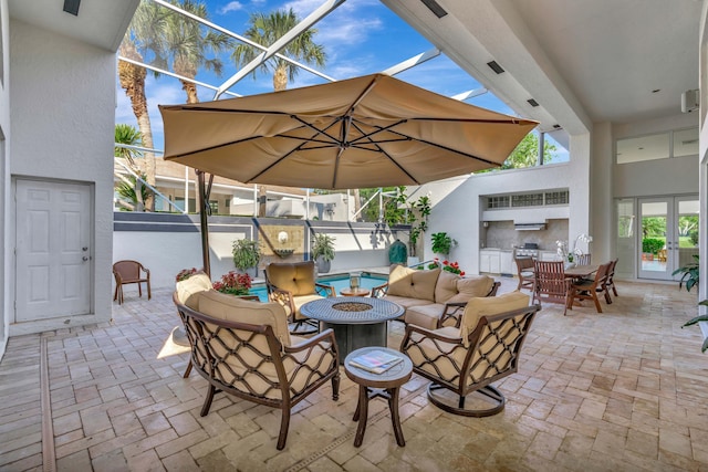 view of patio / terrace featuring glass enclosure, an outdoor living space, french doors, and outdoor dining area