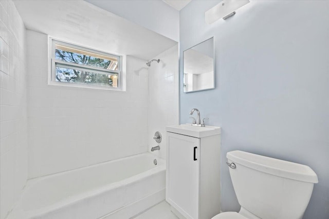 bathroom featuring vanity, toilet, and shower / bathtub combination