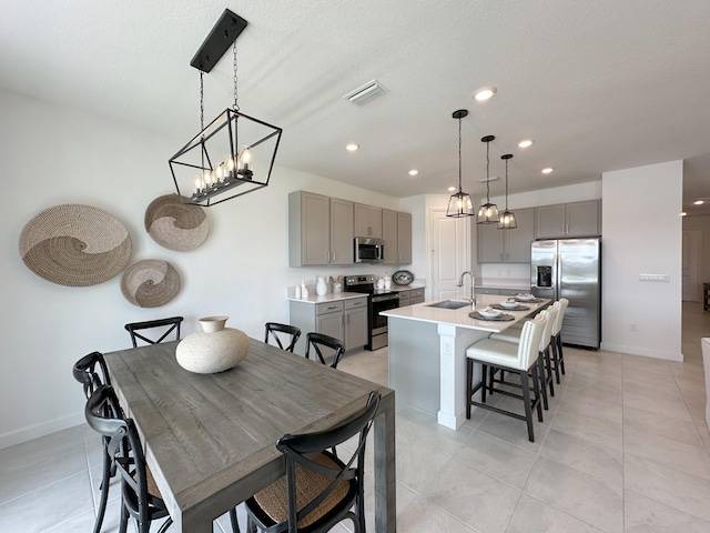 dining space featuring light tile patterned flooring, baseboards, visible vents, and recessed lighting