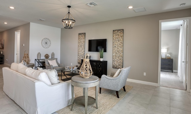 living area with recessed lighting, visible vents, and light tile patterned floors