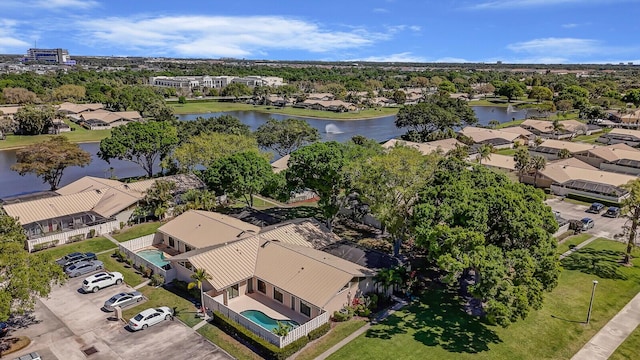 aerial view featuring a water view and a residential view