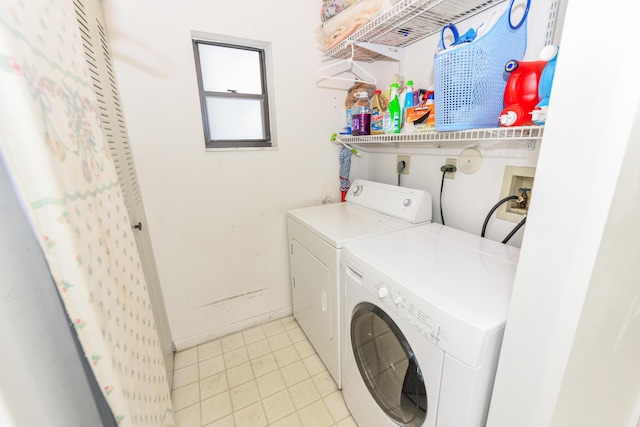 washroom with laundry area and washing machine and clothes dryer