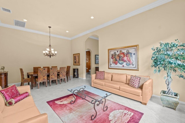 living room featuring visible vents, arched walkways, baseboards, and ornamental molding