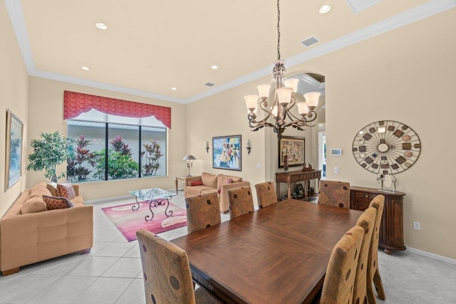 dining room featuring light tile patterned floors, visible vents, a chandelier, and crown molding