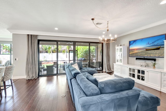 living room with a healthy amount of sunlight, ornamental molding, and dark wood finished floors