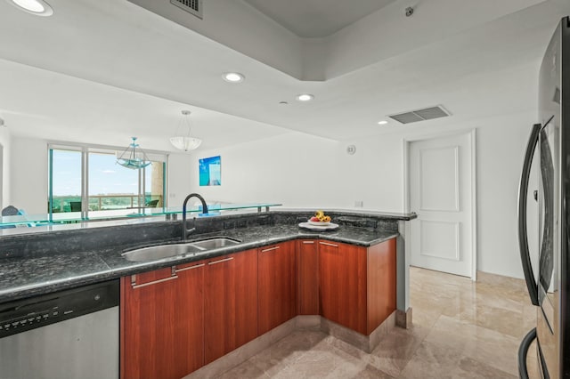 kitchen with visible vents, appliances with stainless steel finishes, modern cabinets, and a sink