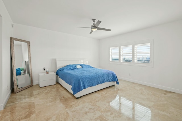 bedroom with baseboards and ceiling fan