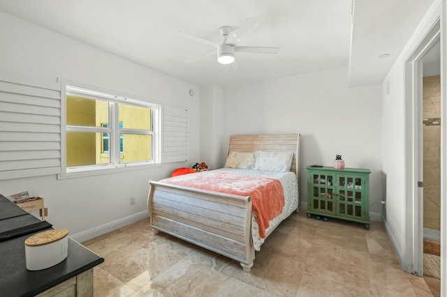 bedroom featuring baseboards and ceiling fan