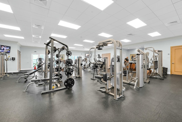 exercise room featuring baseboards and visible vents