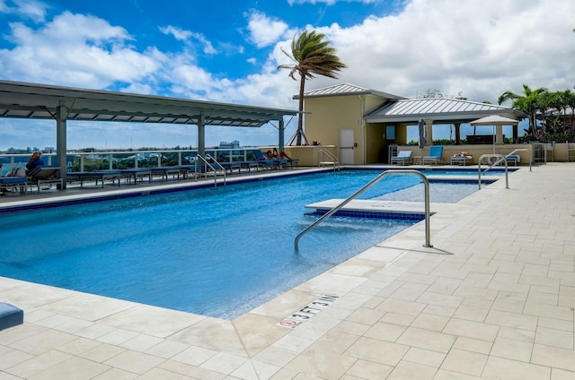 pool featuring a patio