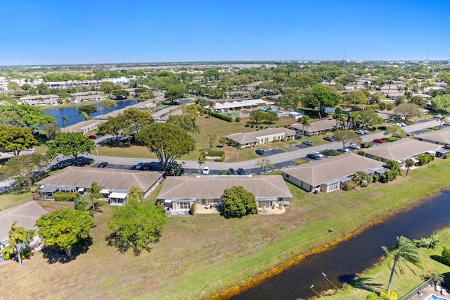 aerial view with a water view and a residential view