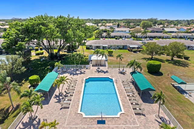 pool with a gazebo and fence