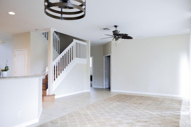 interior space featuring baseboards, visible vents, a ceiling fan, stairs, and recessed lighting