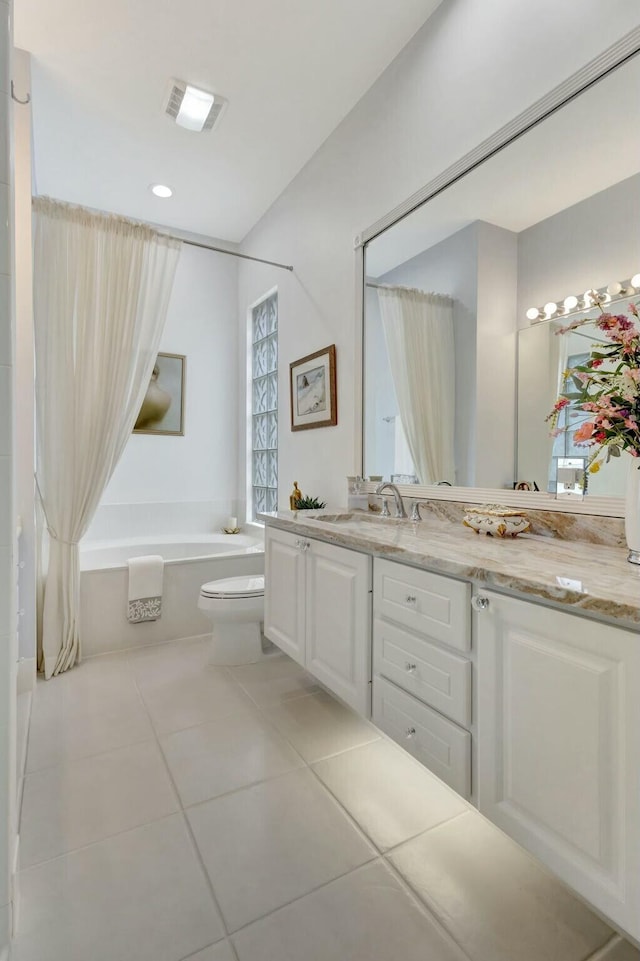 full bathroom with visible vents, toilet, shower / bath combo, tile patterned floors, and vanity