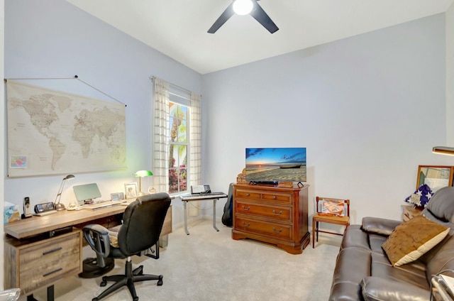 office space with light carpet and ceiling fan