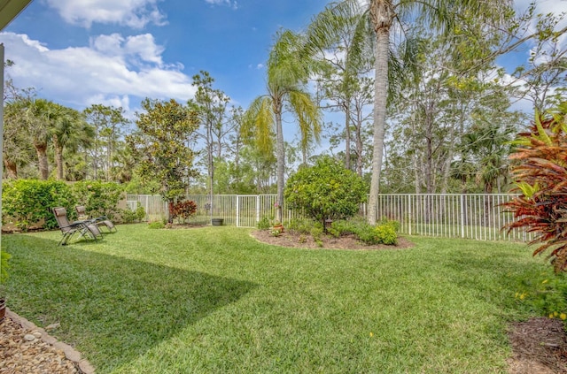 view of yard featuring a fenced backyard