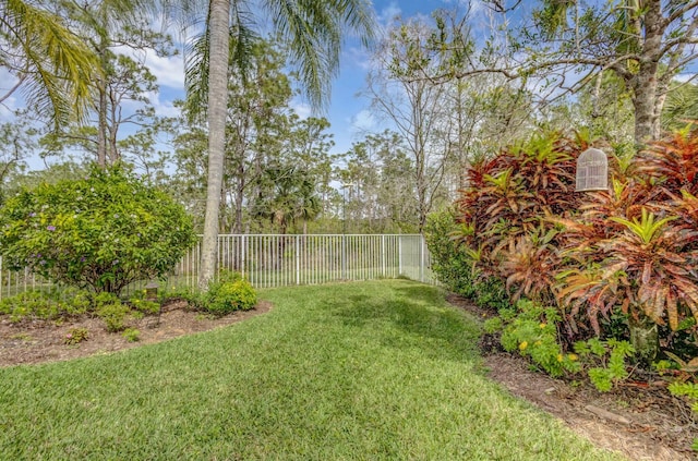 view of yard with a fenced backyard