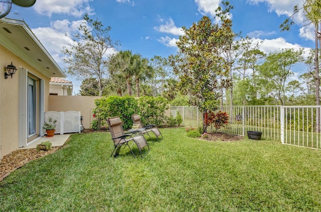 view of yard featuring a fenced backyard