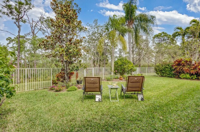 view of yard with a fenced backyard