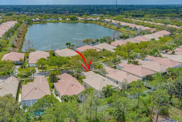 bird's eye view with a residential view and a water view