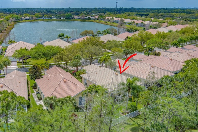 aerial view with a residential view and a water view