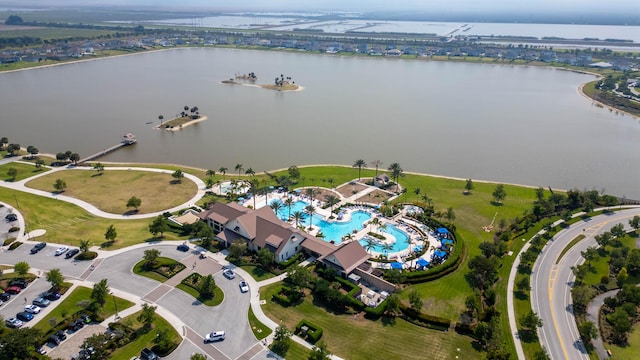 drone / aerial view with a water view