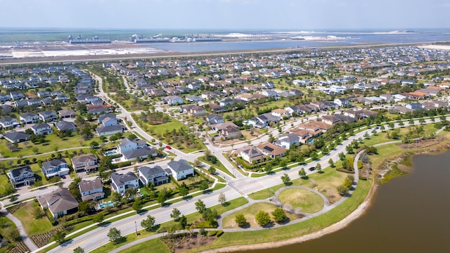 bird's eye view with a water view and a residential view