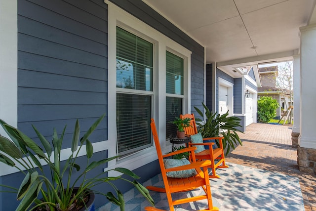 view of patio featuring a porch