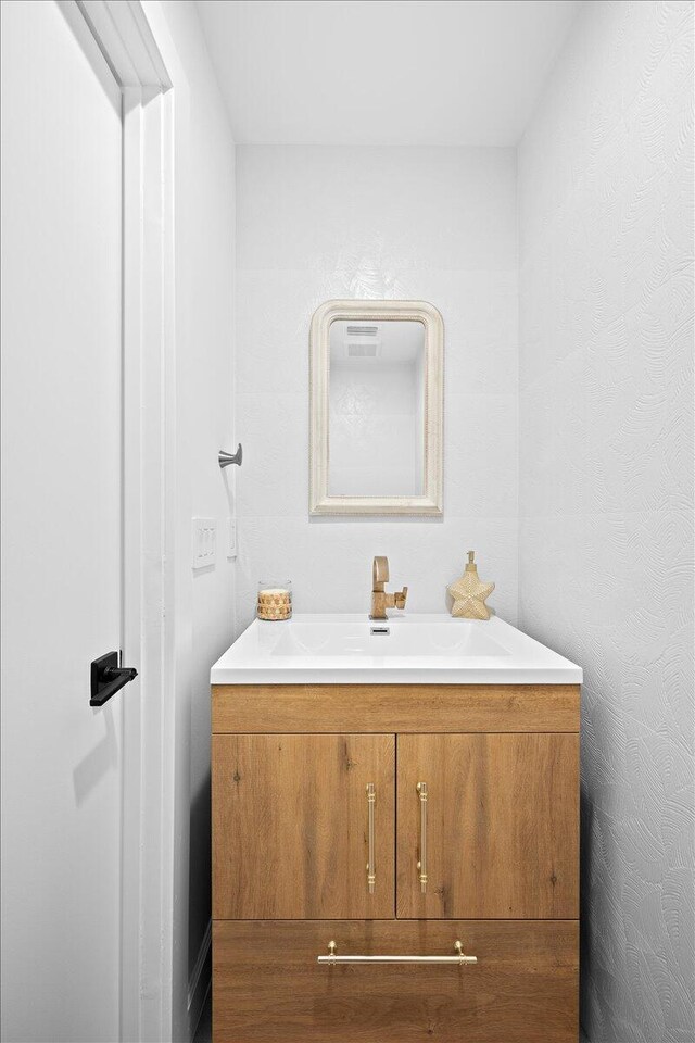 full bathroom with visible vents, toilet, tile walls, and a stall shower