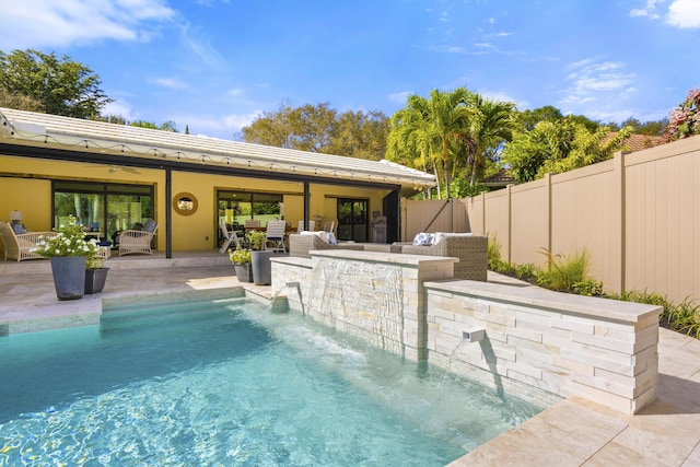 view of pool featuring a patio, a fenced backyard, and a fenced in pool