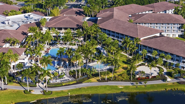 aerial view featuring a residential view and a water view