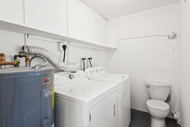 washroom with laundry area, separate washer and dryer, and electric water heater