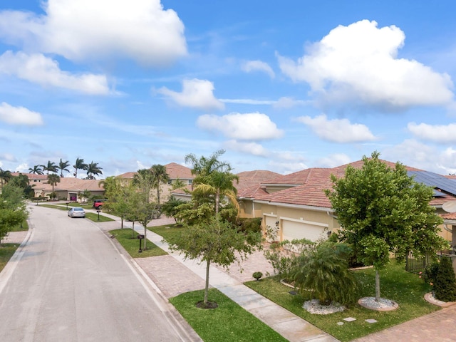 view of road with a residential view