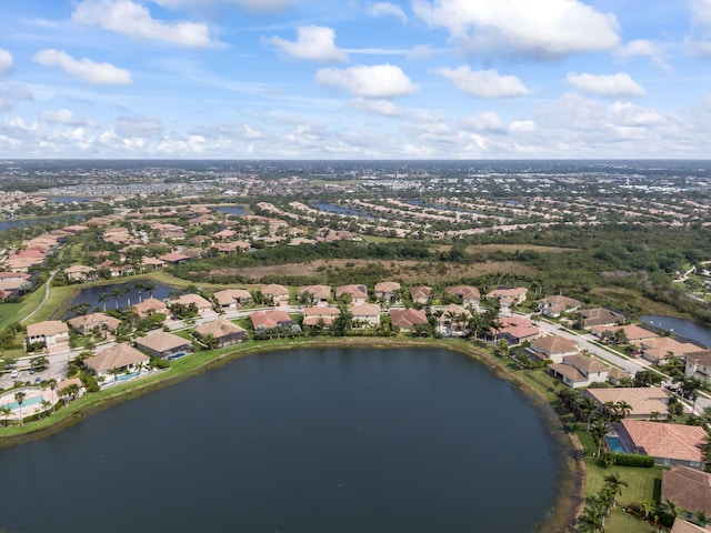 aerial view featuring a residential view and a water view