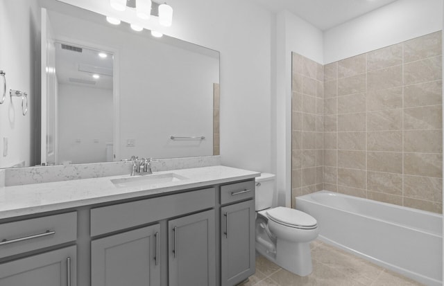 7648 SW Lucy Ln Latitude, Unit Latitude, Stuart, FL 34997 - full bath with toilet, vanity, tile patterned flooring, and bathtub / shower combination