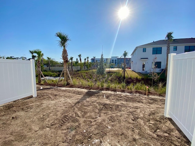 view of yard with fence