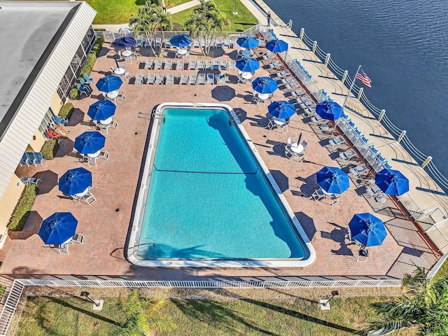 birds eye view of property with a water view