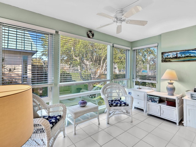 sunroom / solarium with ceiling fan and a healthy amount of sunlight