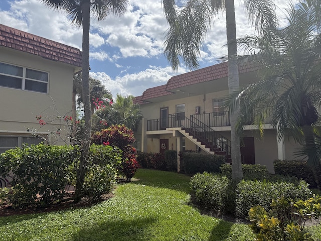 view of yard featuring stairs