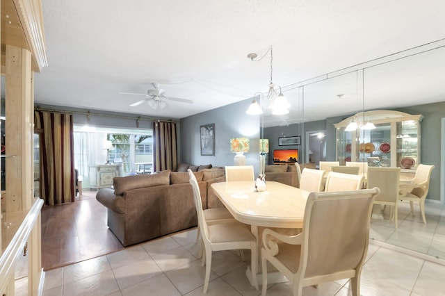 1 Abbey Ln Unit 201, Delray Beach, FL 33446 - dining area featuring ceiling fan and light tile patterned floors