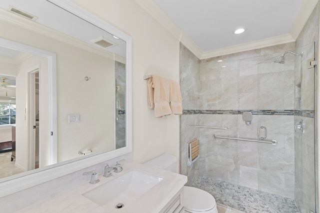 ensuite bathroom with visible vents, a stall shower, toilet, and ornamental molding