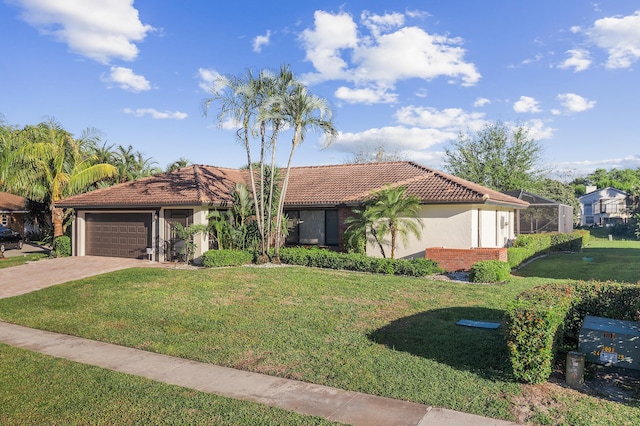 view of front of property with stucco siding, driveway, glass enclosure, a front yard, and an attached garage