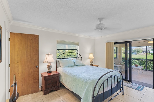 bedroom featuring a textured ceiling, access to exterior, light tile patterned flooring, and ornamental molding