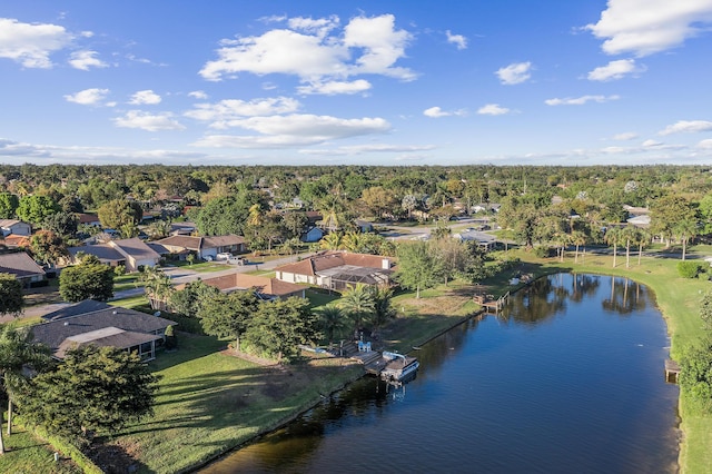 birds eye view of property featuring a residential view and a water view