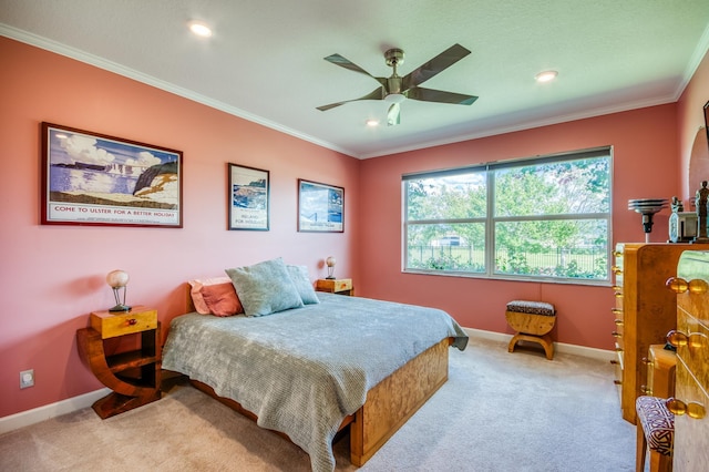 bedroom with carpet, ornamental molding, baseboards, and recessed lighting